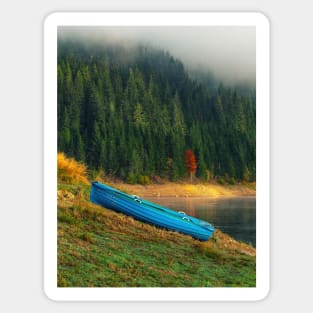 Wooden blue boat ashore autumn colors Sticker